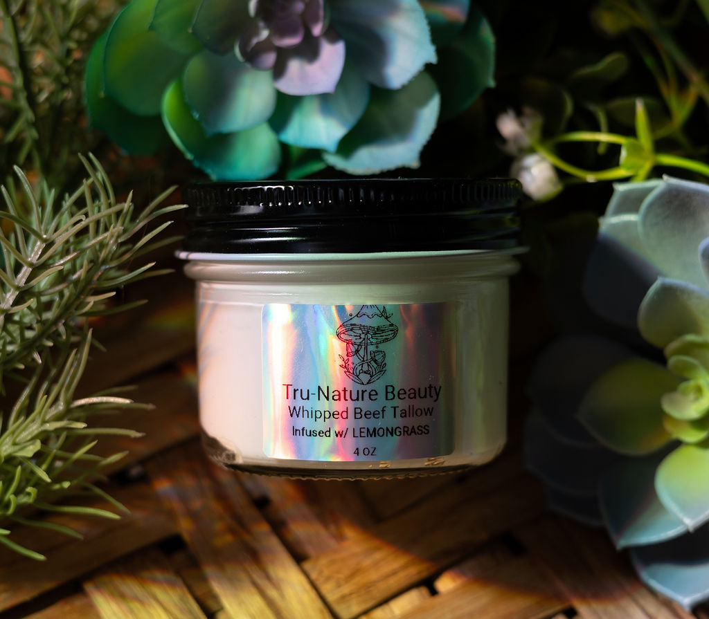 Jar of Tru-Nature Beauty whipped beef tallow product with succulents in the background